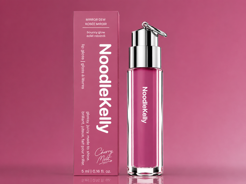 Noodlekelly lip gloss bottle and packaging on a pink background